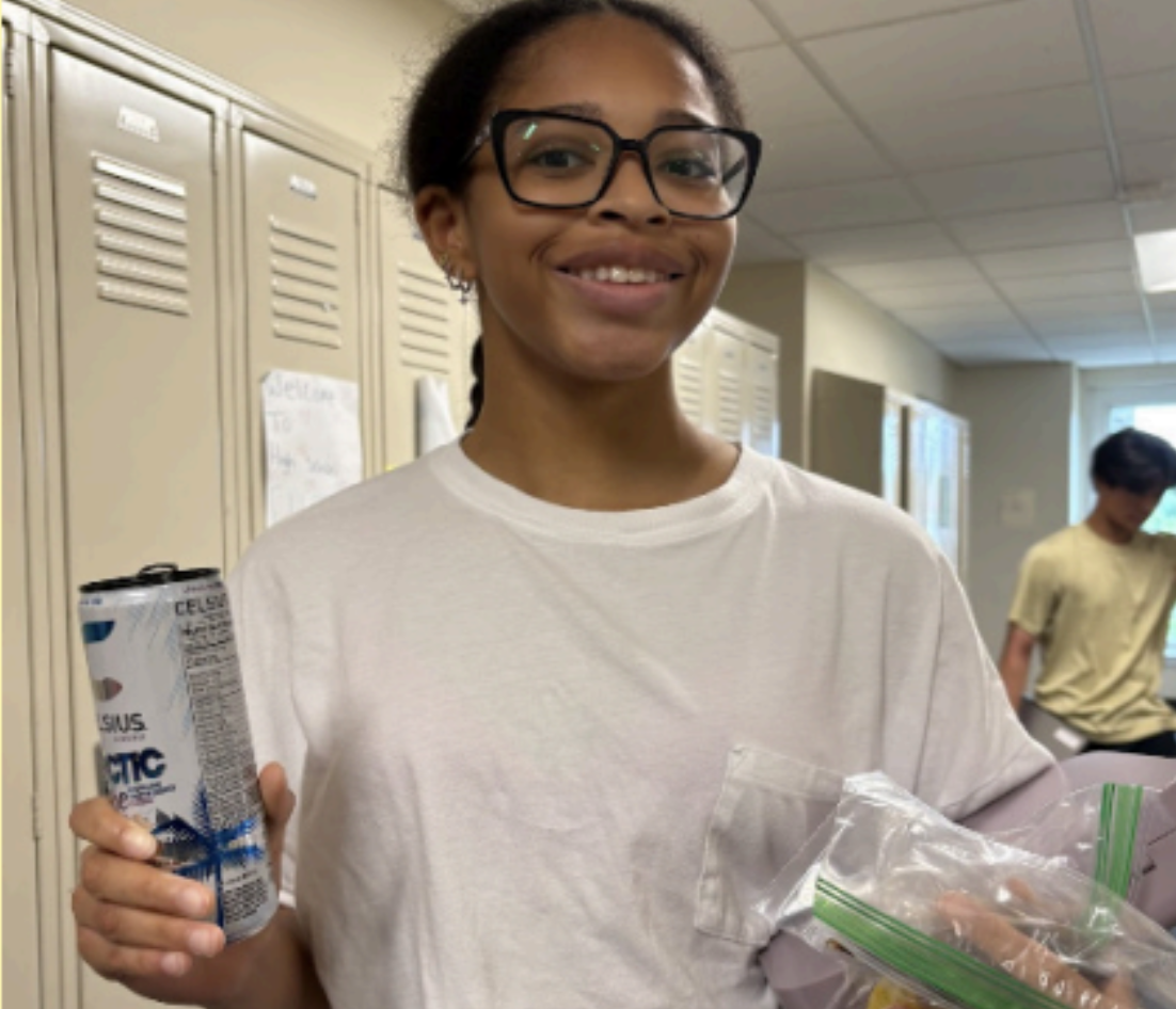 Sommer Smith ‘28 holds up an energy drink. Photo: Morgan Kim
‘27